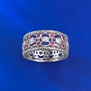 Detailed view of S925 silver lace ring with pink triangle and white round gemstones