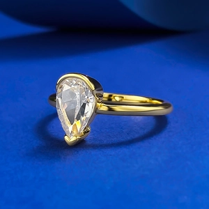 Elegant gold S925 silver ring featuring a 6x9mm pear-cut radiant white diamond stone