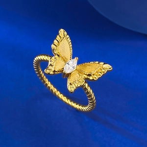 Gold plated S925 silver butterfly ring with brushed finish and marquise cubic zirconia