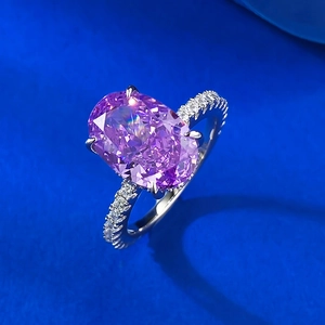 Luxurious S925 silver ring featuring an oval purple gemstone and pavé side diamonds