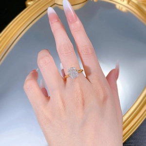 Close-up of a gold-plated S925 silver ring with a large ice-cut radiant carbon diamond