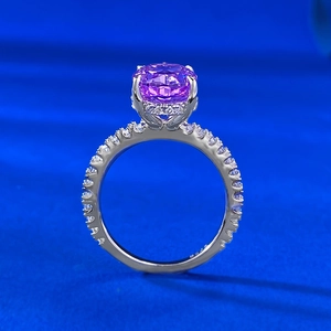 Macro detail of S925 sterling silver ring with large oval purple cushion cut stone