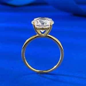 Classic 10mm round cut diamond ring in golden finish with four-prong setting