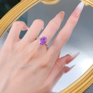 Elegant S925 silver ring featuring an oval purple gemstone with micro-pave white diamonds