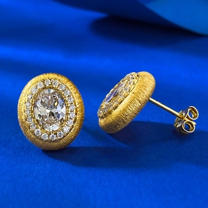 Boucles d'oreilles vintage ovales dorées brossées avec pavé de cristaux