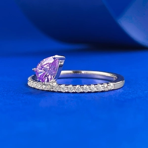 Elegant S925 silver ring with a pear-shaped purple gemstone and sparkling zircon accents