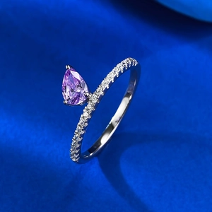 S925 silver ring featuring a pear-cut purple drop gemstone with sparkling side accents