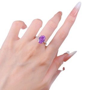 Elegant S925 silver ring featuring an oval purple gemstone with micro-pave diamond setting