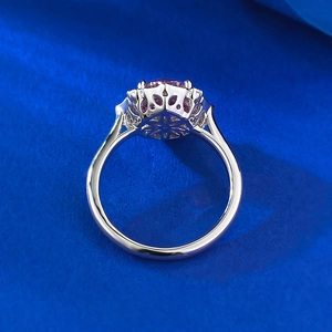 Detail view of S925 silver ring with pink diamond and intricate floral hollow carving