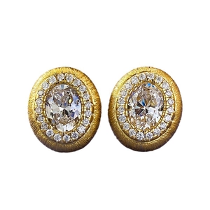 Boucles d'oreilles ovales vintage en or brossé avec halo de cristaux scintillants
