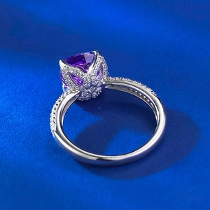 Macro detail of 925 silver ring featuring a lavender purple gemstone in bud-shaped setting