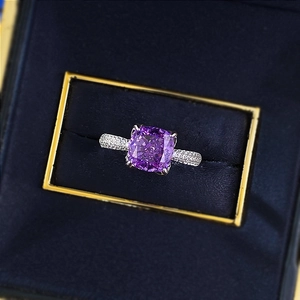 Macro shot of 925 silver ring featuring a lavender purple square cut gemstone in velvet box