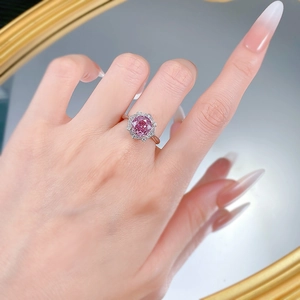 Macro shot of S925 silver ring with millennium rose cut pink sparkling gemstone