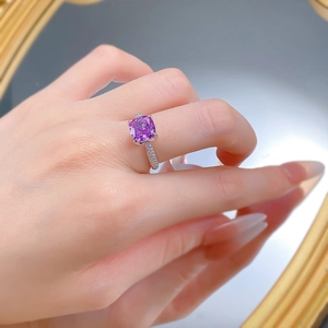 925 silver ring featuring a cushion-cut lavender purple stone and side pavé diamonds