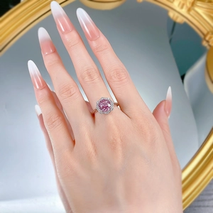 Macro shot of S925 silver ring with millennium rose-cut pink diamond and micro-pave halo