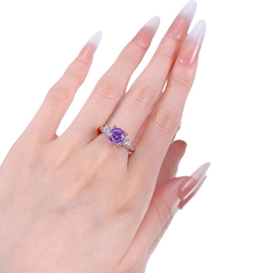 Elegant S925 silver ring featuring 8mm purple firework-cut zircon on a finger