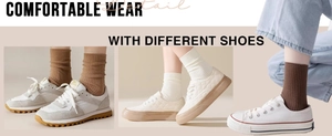Detail view of ribbed cotton socks in various colors paired with casual sneakers
