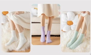 Detailed close-up of fluffy coral fleece socks in pearl white, purple and mint green