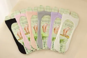 Close-up of colorful aloe fiber toe socks with non-slip silicone pads and individual toe slots