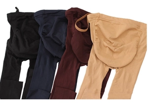 Detail of adjustable elastic waistband with buttons on four colored maternity leggings