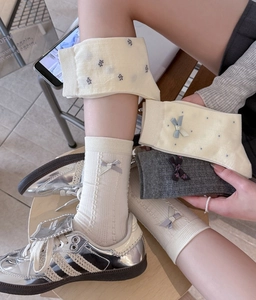 Detail showing vintage balletcore cotton socks with 3D bows and floral embroidery