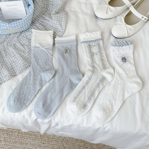 Blue and white mesh socks with lace bows and bear embroidery in a set of four pairs
