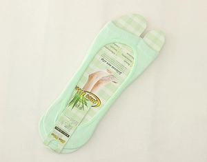 Detail of aloe fiber open-toe liner socks with silicone non-slip grip and breathable texture
