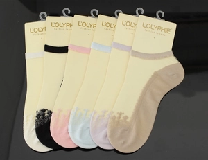 Close-up of 6-pack women's lace trim invisible boat socks in assorted pastel colors