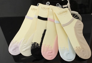 Lace no-show socks for women in six pastel colors on professional product display