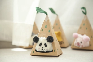 Gift box with coral fleece animal socks featuring panda and pig 3D embroidery details
