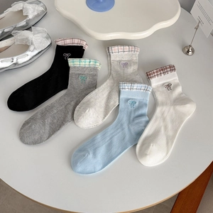 Five pack of women's mesh crew socks with lace trim and elegant butterfly embroidery