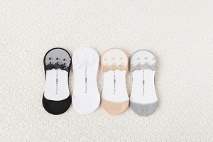 Detail of four-color lace invisible socks with breathable hollow floral mesh and cotton sole
