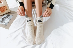 Cozy cream coral fleece sock detail with cute cartoon monster ears and high-quality texture