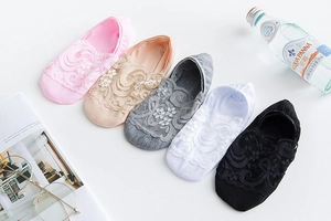 Detailed flat lay of women lace boat socks in five colors with floral patterns and cotton blend