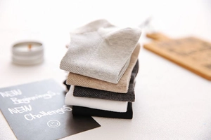 Detailed stack of five pairs of cotton knit loafers socks in assorted neutral colors