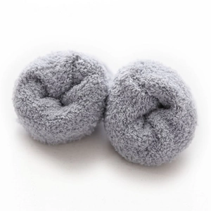 Set of two gray fuzzy coral fleece hair scrunchies on a clean white background
