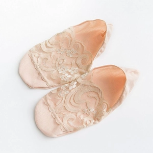 Lace boat socks for women featuring floral lace patterns and anti-slip heel design