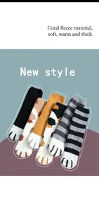 Detail of six pairs of thick coral fleece cat claw socks in various colors and patterns