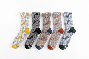 Detailed view of 5 pairs of vintage floral crew socks with textured 3D knit patterns
