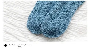 Detailed close-up of blue coral fleece socks with smooth flat-seam toe construction