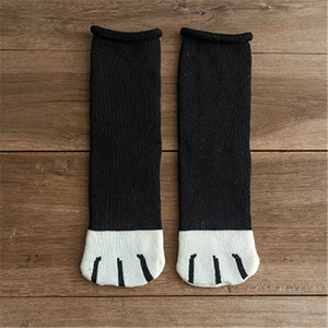Thick warm cotton crew socks with creative black and white cat paw design and rolled cuff