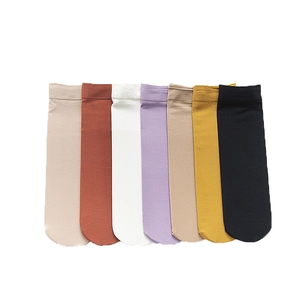Women's high-density velvet cotton socks in multiple colors including pink, red, and black