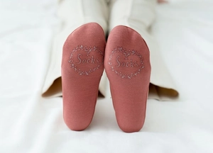 Detail of non-slip silicone floral pattern on the bottom of ice silk invisible socks