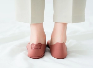 Close-up of pink no-show socks with non-slip silicone heel grip for women