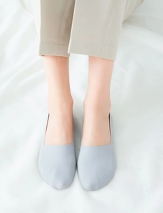 Close-up of light blue ice silk invisible boat socks with seamless cut for women
