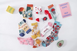 Detailed view of sheer summer mesh socks with cute fruit patterns and pastel cotton cuffs