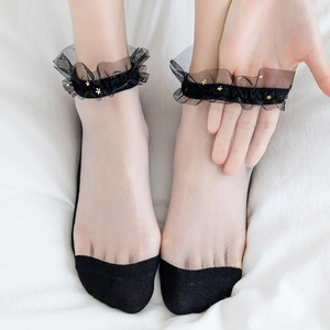 Sheer glass silk socks with black lace ruffles and gold star patterns for women