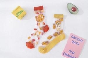 Detail of transparent mesh socks with cute cartoon hedgehog and lion embroidery patterns