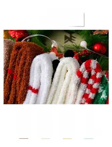 Detail of coral fleece Christmas socks featuring soft textures and festive patterns