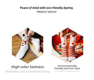 Close-up of cozy coral fleece Christmas socks featuring eco-friendly fabric and high color fastness